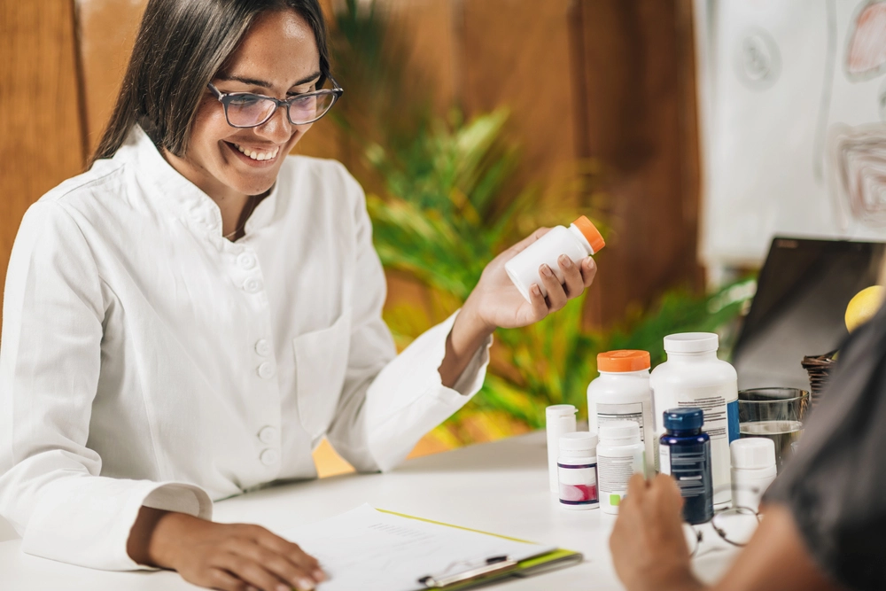 functional medicine doctor reviewing supplements with patient